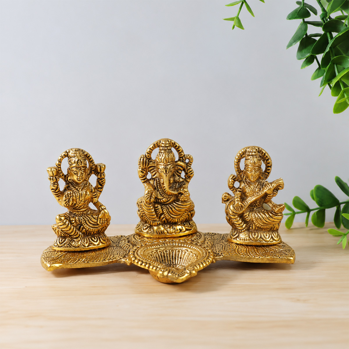Metal Laxmi Ganesh Sarswati With Diya - Shubhanjali Store (1) lakshmi ganesh saraswati metal statue