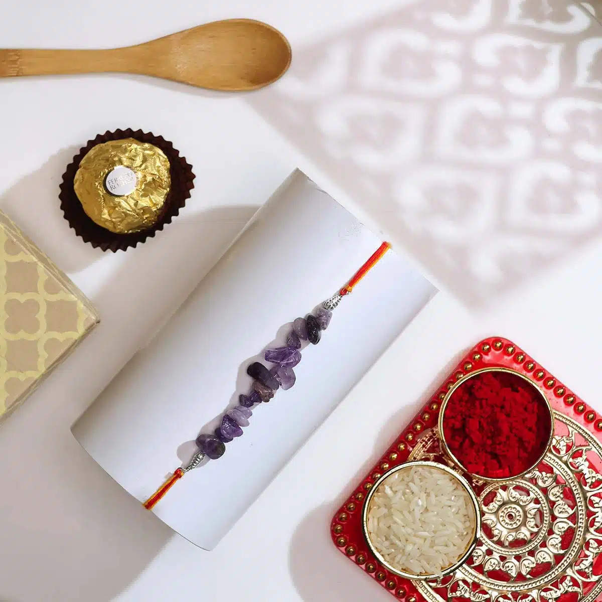 Shubhanjali-Amethyst Chips Crystal Rakhi (3) Shop Natural Amethyst Chips Crystal Rakhi