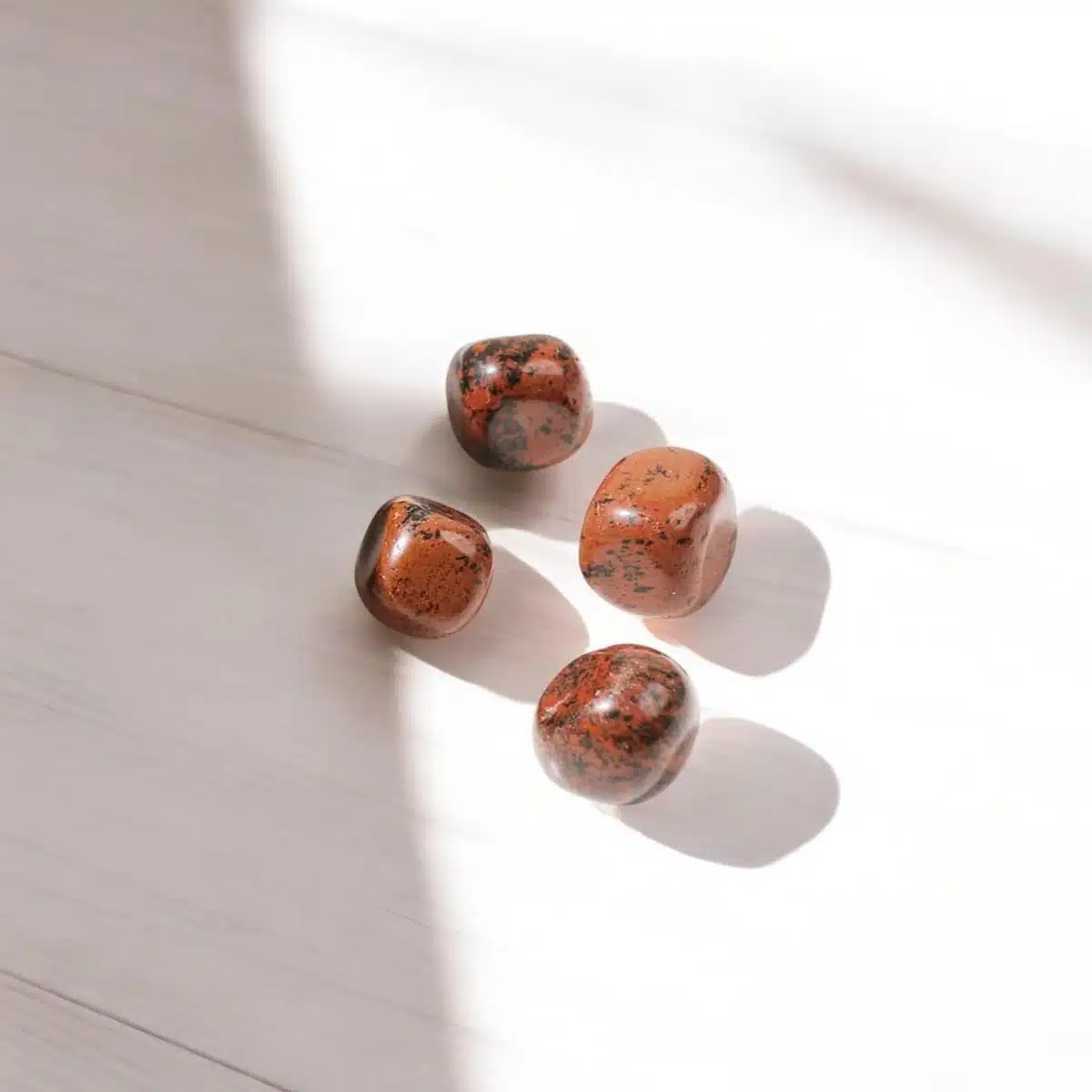 Mahogany-Obsidian-Tumble-Stones-Shubhanjali-2-Photoroom (1)