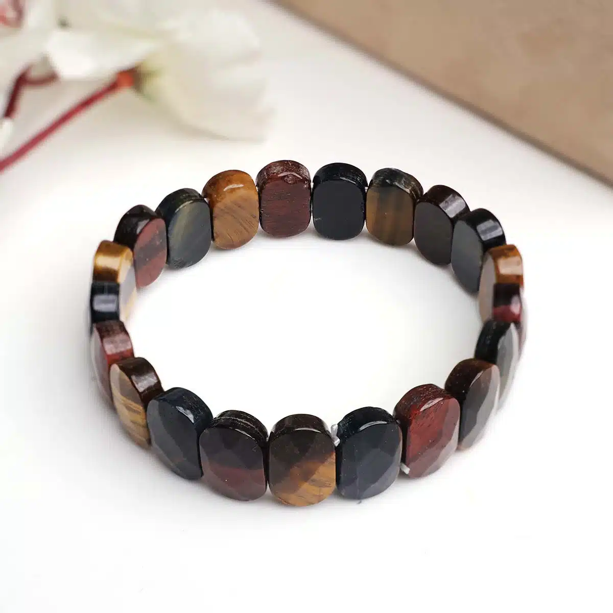 Multi Tiger Eye Oval Faceted Bracelet-Shubhanjali (5) Shop Multi Tiger Eye Crystal Oval Faceted Bracelet