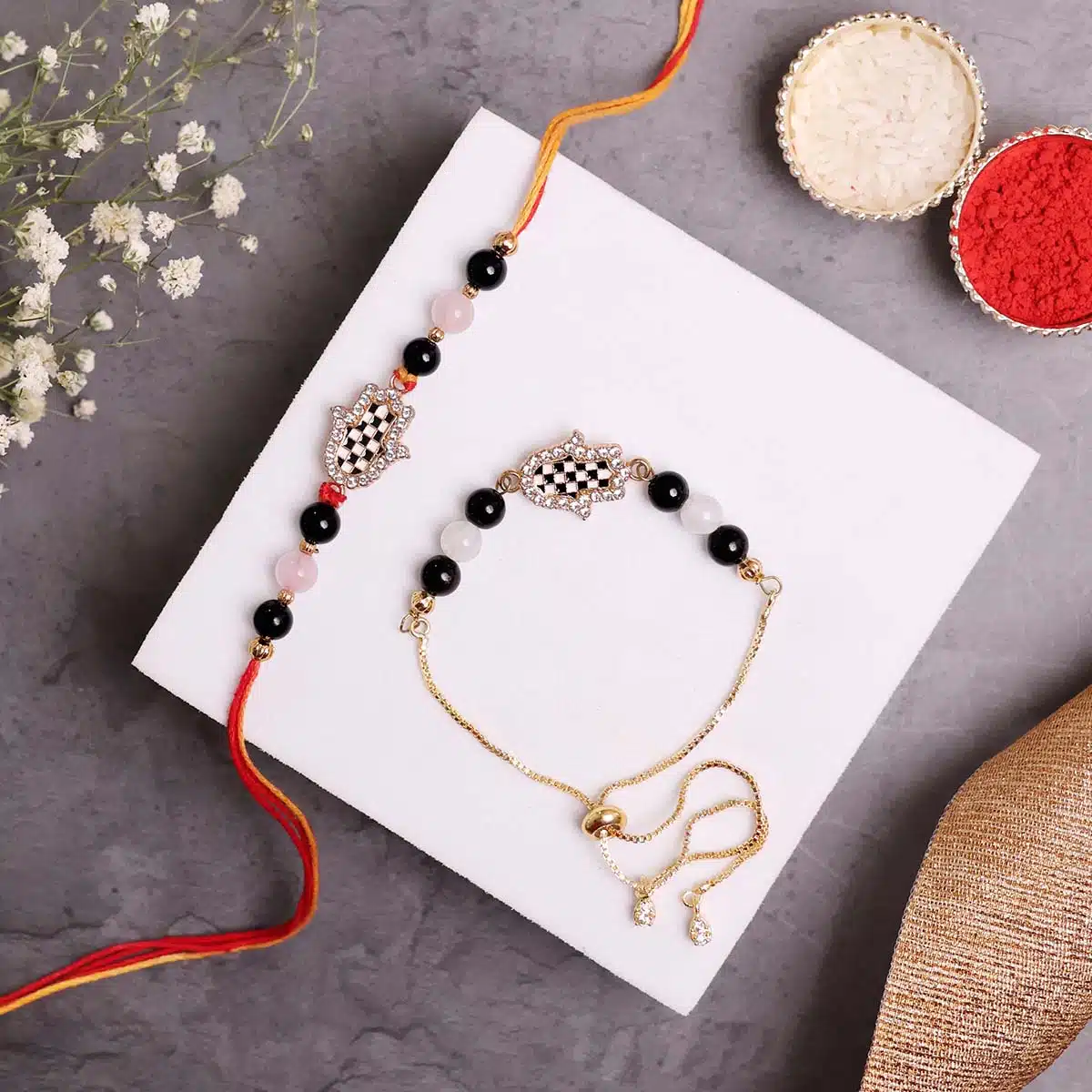 Shubhanjali-Diamond Hamsa Hand Chess Rakhi (2) Diamond Hamsa Hand Chess Rakhi