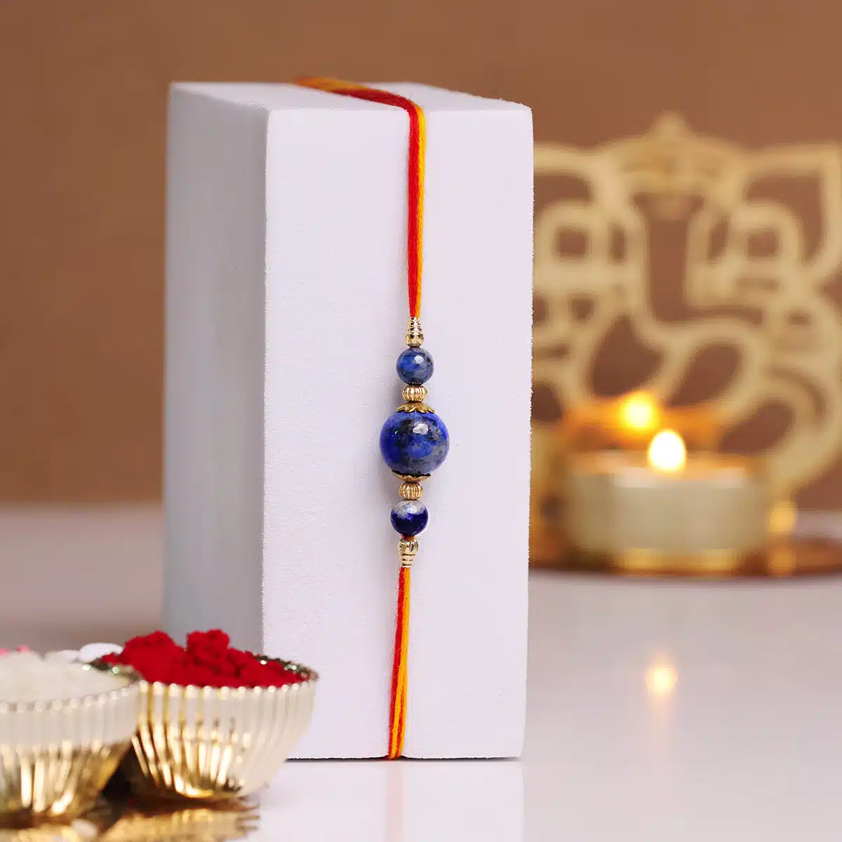 Shubhanjali-Lapis Lazuli 3 Beads Crystal Rakhi (4) Shop Natural Lapis Lazuli Crystal 3 Beads Rakhi