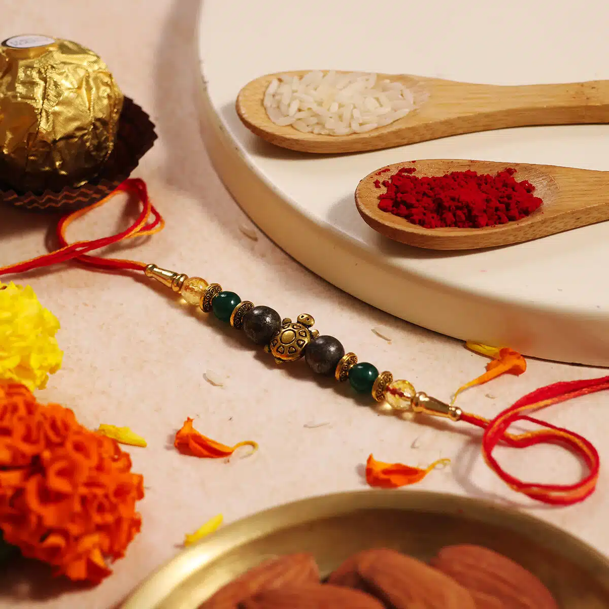 Shubhanjali-Turtle Money Magnet Crystal Rakhi (3) Shop Turtle Charm Money Magnet Crystal Rakhi