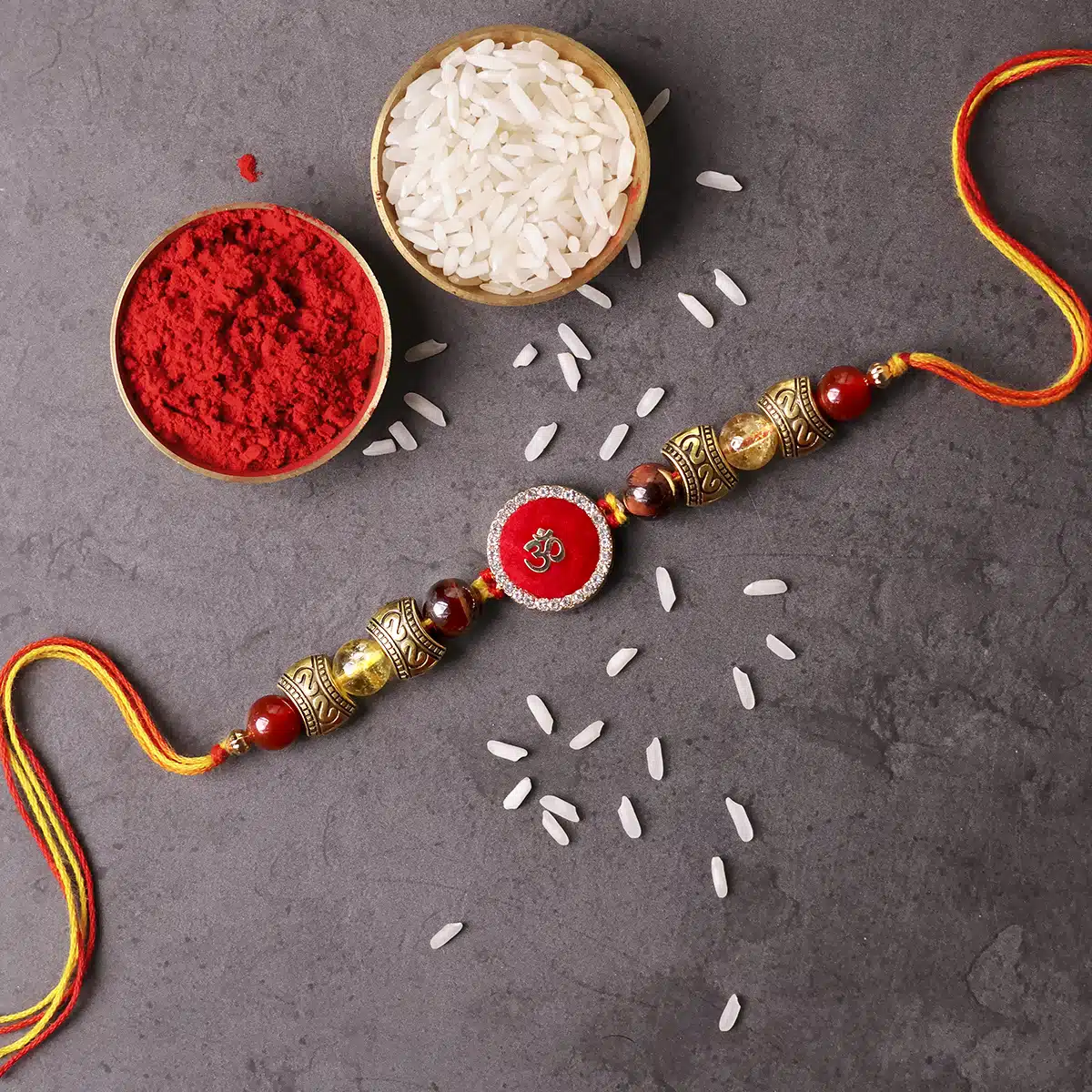 motivation-rakhi-with-red-om (1)