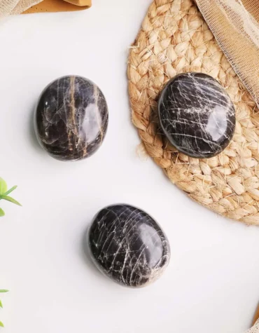 black moonstone palm stone