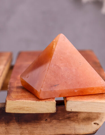red aventurine stone pyramid