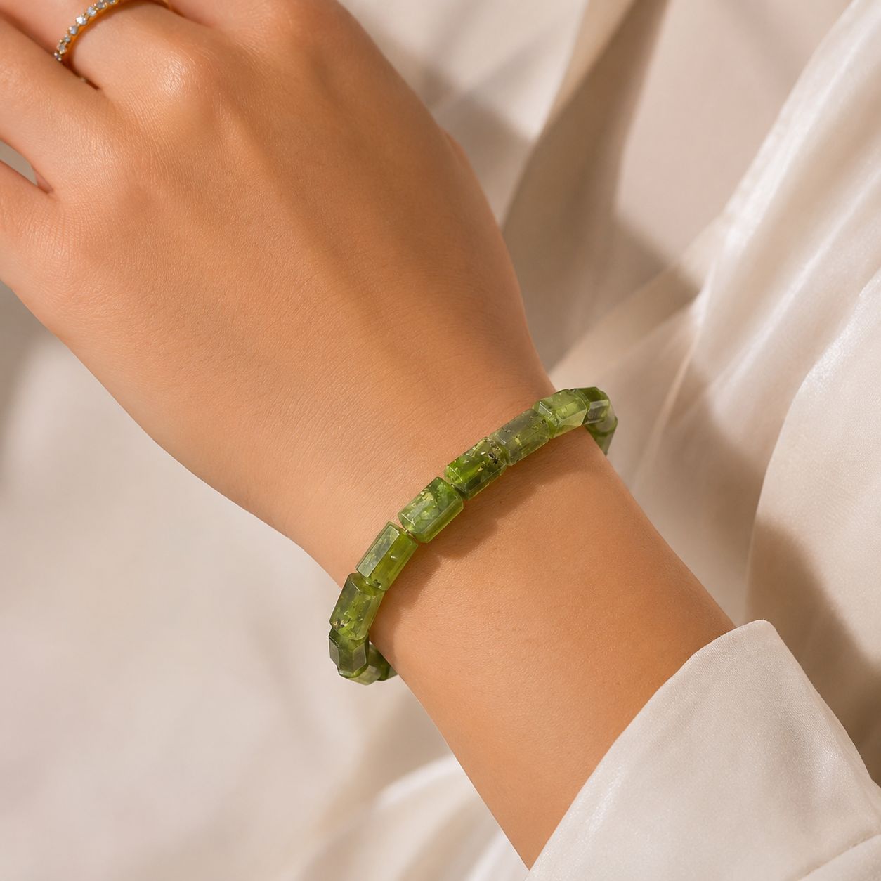 7bfa774a-5ac3-4e13-864b-0afc0f85eacd vesuvianite faceted tumble bracelet